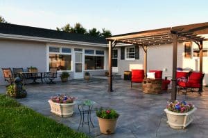 patio,living,space,with,comfortable,seating,around,fire,pit,under